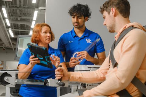 ABT student Afeef Shaik works in the Sports Medicine Research Institute with mentor Assistant Professor Kimberly Tumlin.
