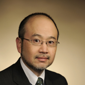 headshot of Tadahide Izumi